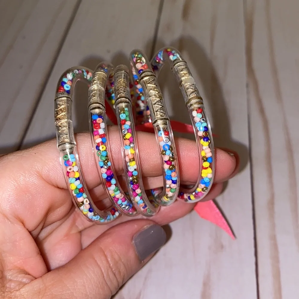 Little girls clear multi colored confetti plastic bracelets